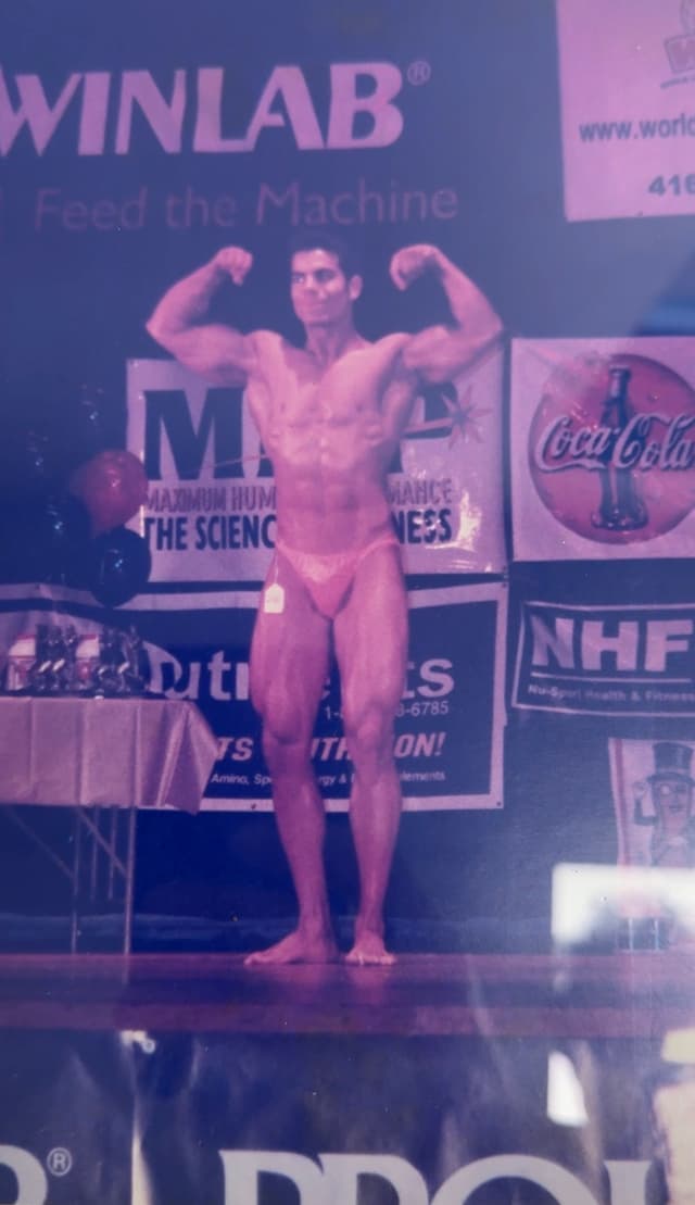 Alex Savva winning his first natural bodybuilding title at 20